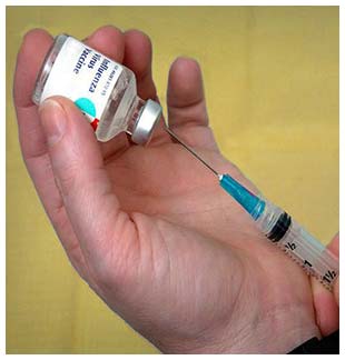 Family sues pharmaceutical company over child brain damaged by flu vaccine